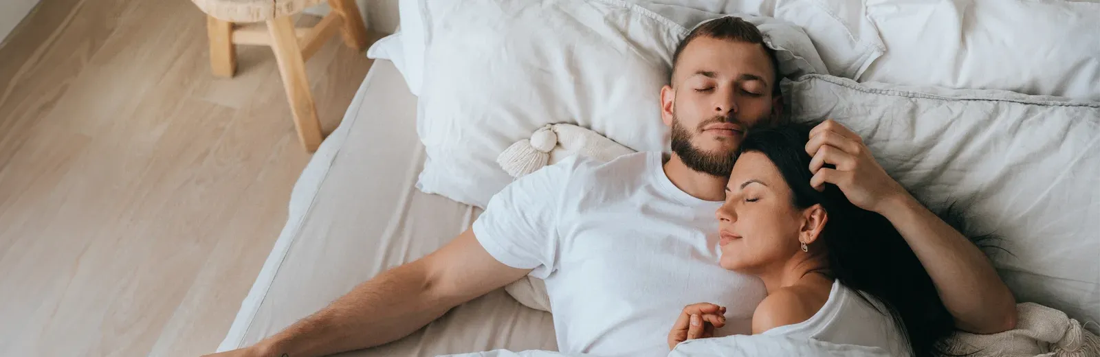 couple sleeping peacefully in bed bug free bed